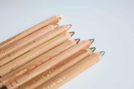 Lük Beautifood Luminous Eye Crayons in a line, showing their shimmer tips