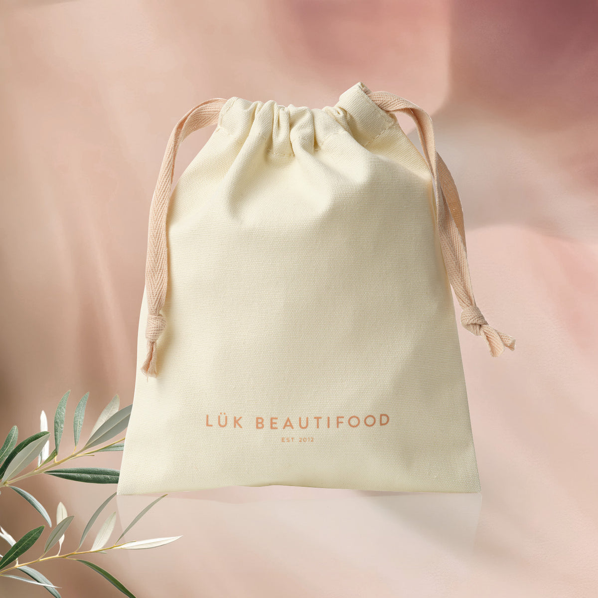 Reusable cotton Christmas gift bag styled as gift wrapping