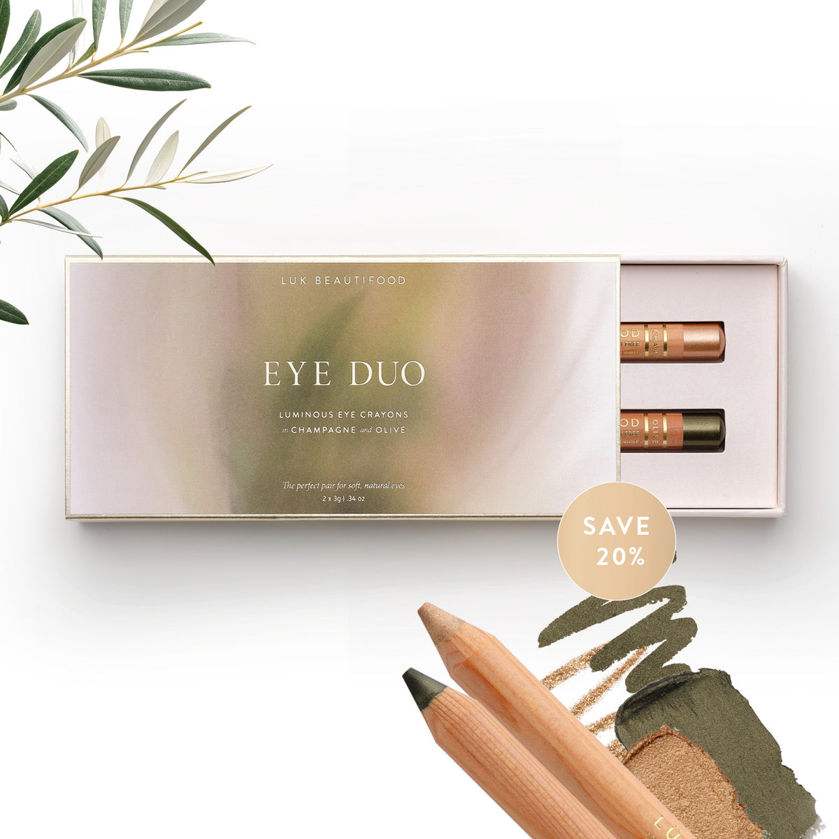 Lük Beautifood Golden Olive Eye Duo gift box open with Olive and Champagne eye crayons