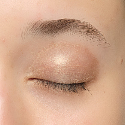 Lük Beautifood Luminous Eye Crayon in Champagne — Champagne swept across the eyelid as a shimmer eyeshadow