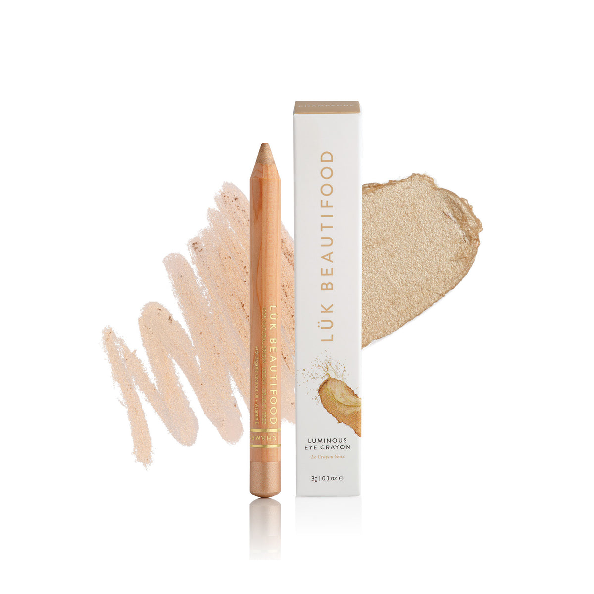 Lük Beautifood Luminous Eye Crayon in Champagne, a warm honey gold, shown with swatch