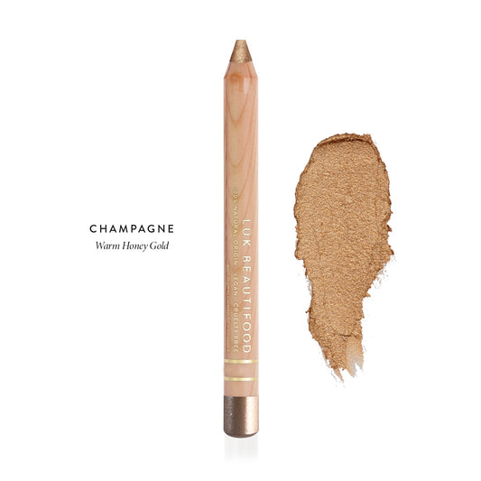 LÜK Beautifood Luminous Eye Crayon in Champagne, warm honey gold, shown with swatch