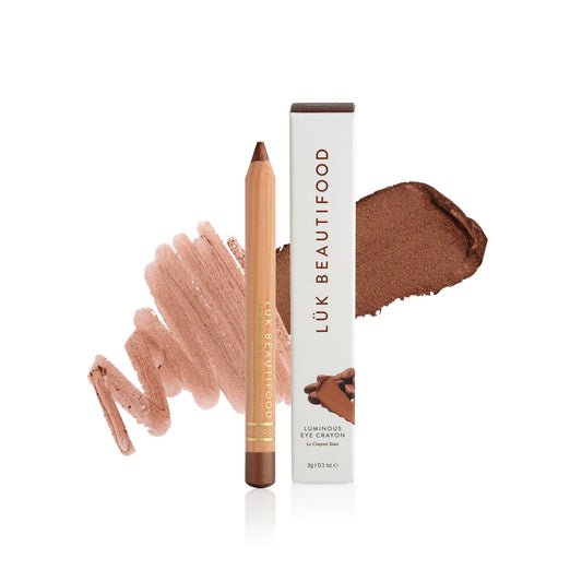 Lük Beautifood Luminous Eye Crayon in Cocoa, a burnished bronze, shown with swatch