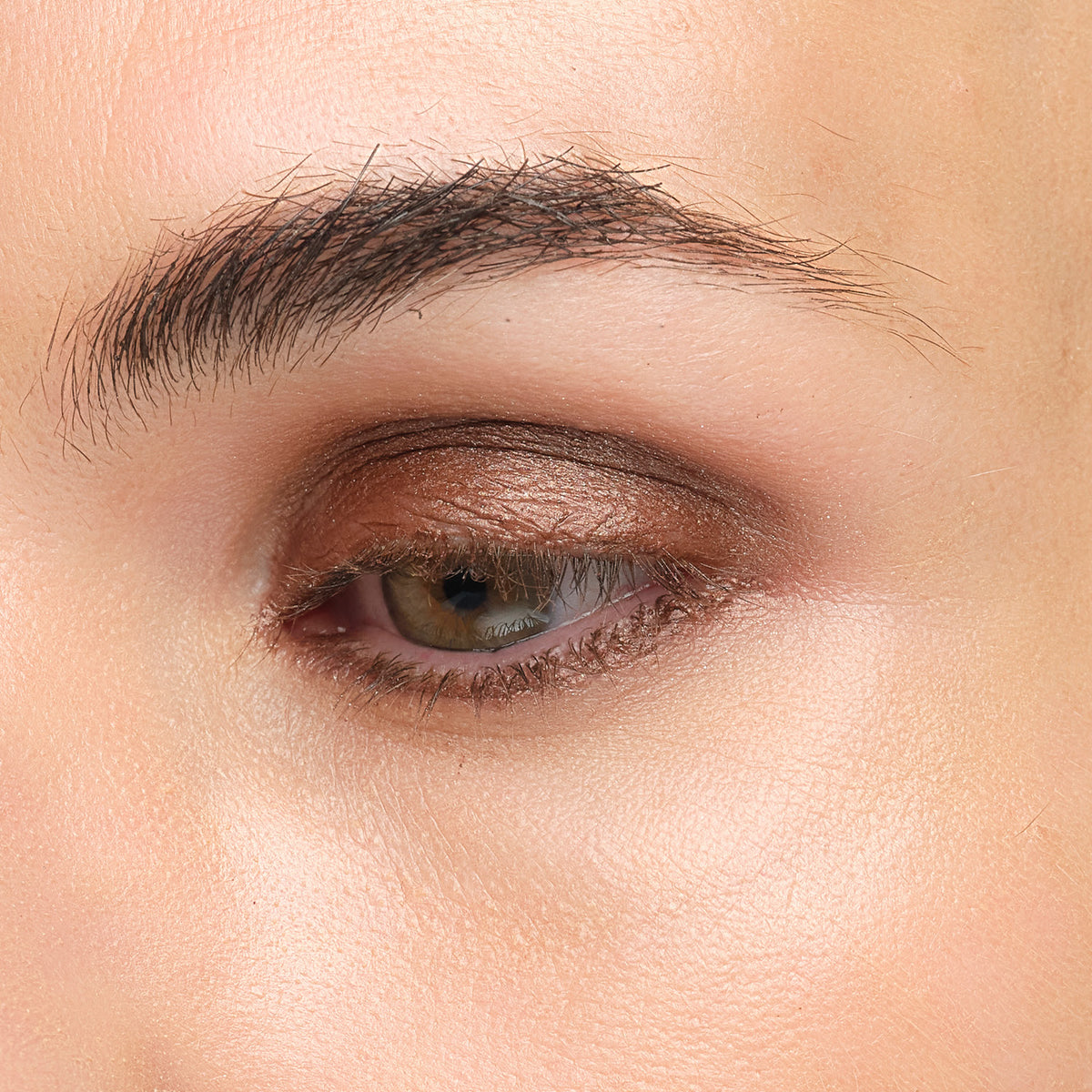 Lük Beautifood Luminous Eye Crayon in Cocoa — Cocoa eyeshadow on the open eye