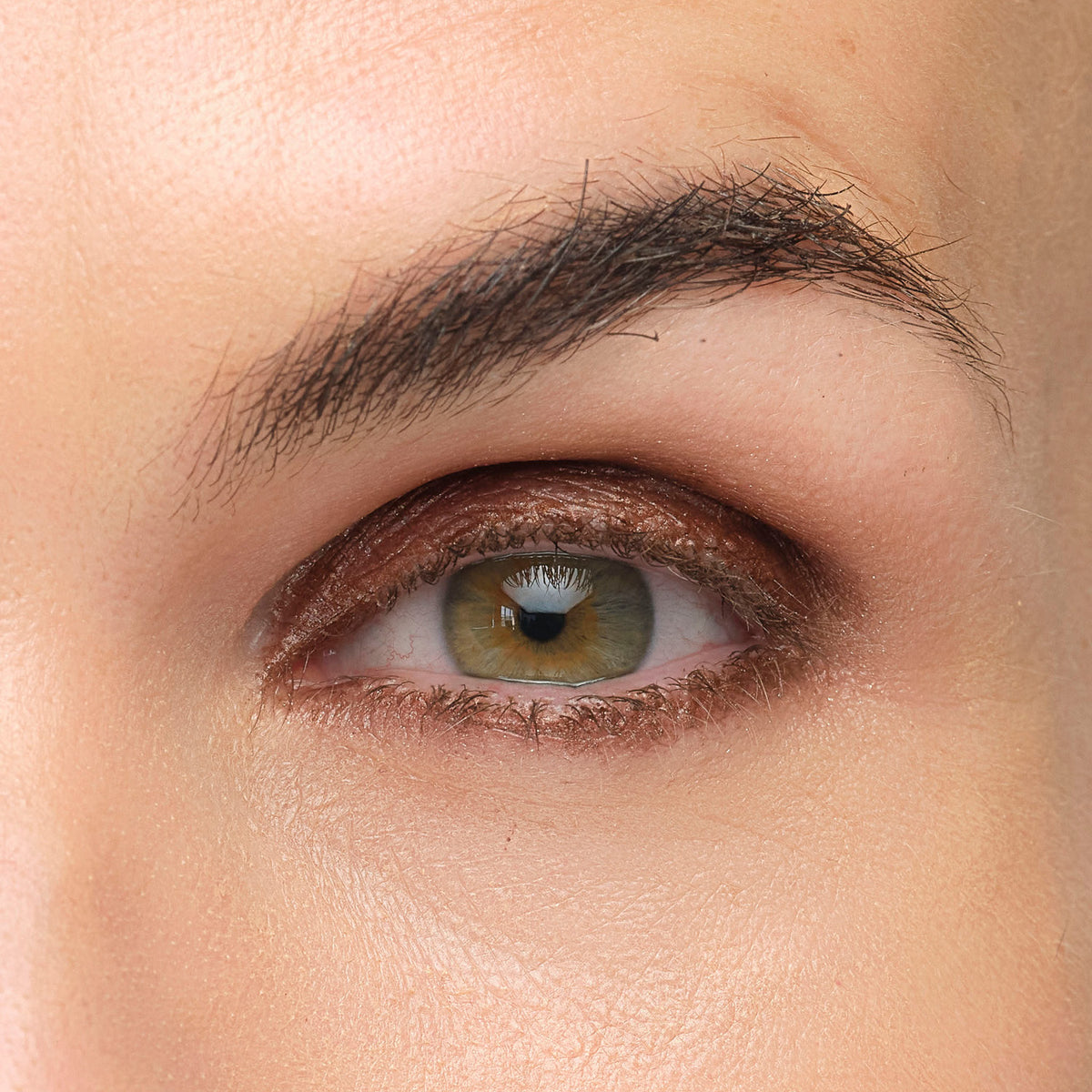 Lük Beautifood Luminous Eye Crayon in Cocoa — Close-up of an eye lined with Cocoa