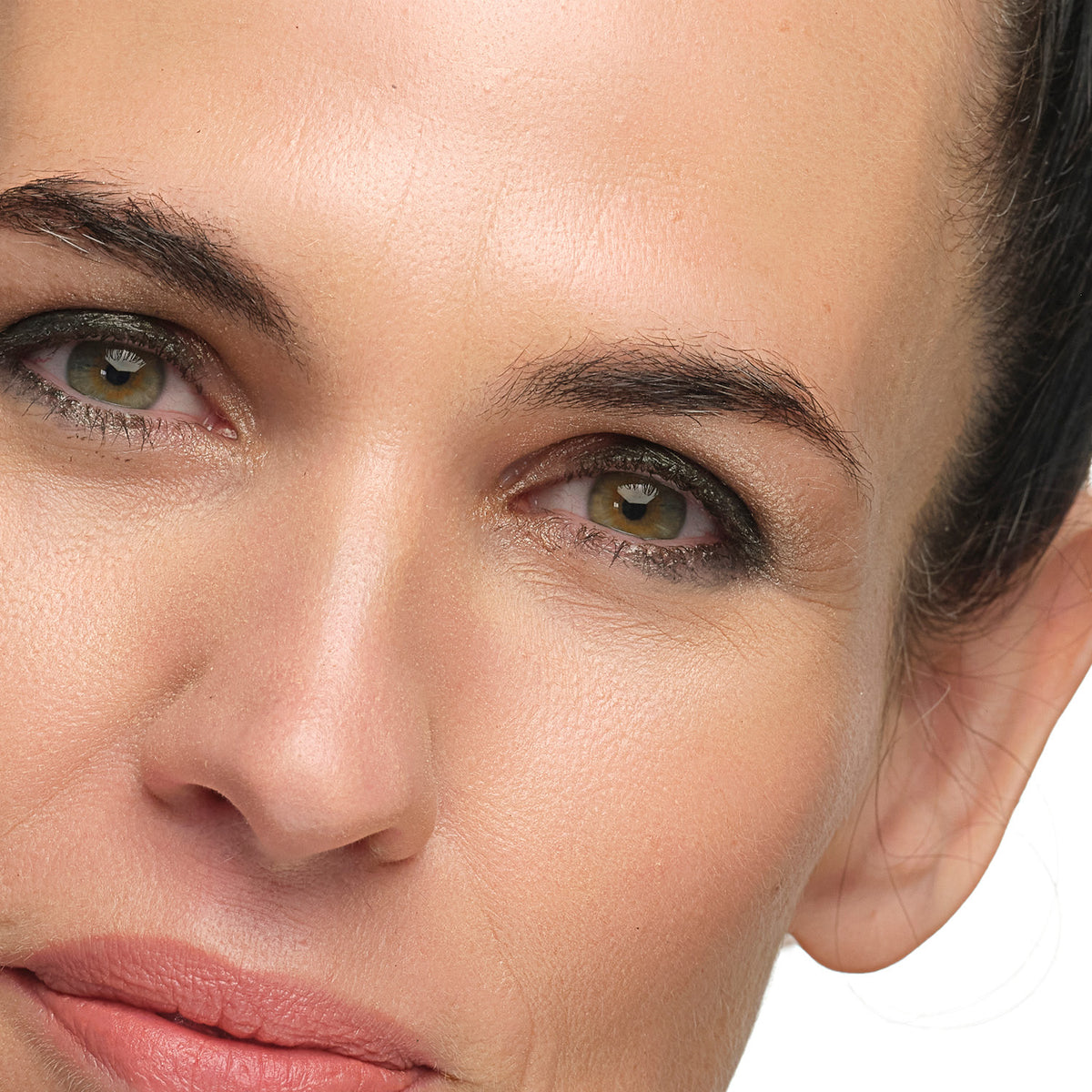 Lük Beautifood Luminous Eye Crayon in Olive — Close-up of a model wearing Olive to define the eyes