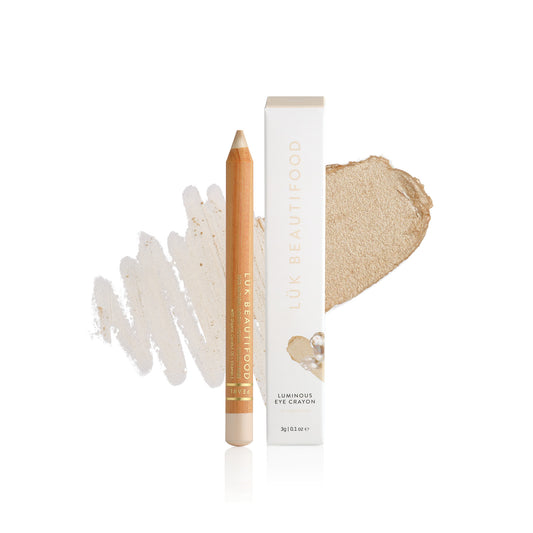 Lük Beautifood Luminous Eye Crayon in Pearl, a soft vanilla gold, shown with swatch